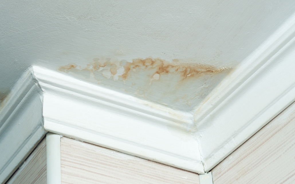 Front view of a ceiling affected by water damage