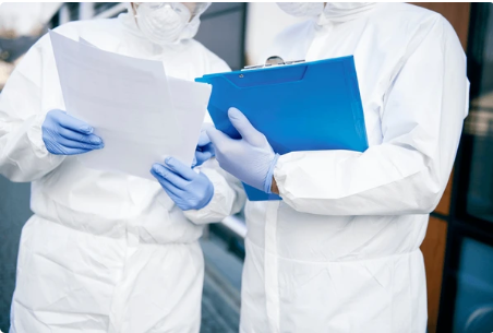 7 Urgent Truths About Asbestos Removal Leon Valley TX That Could Save Your Family's Life 5 Certified asbestos removal Leon Valley TX team reviewing safety plan before abatement